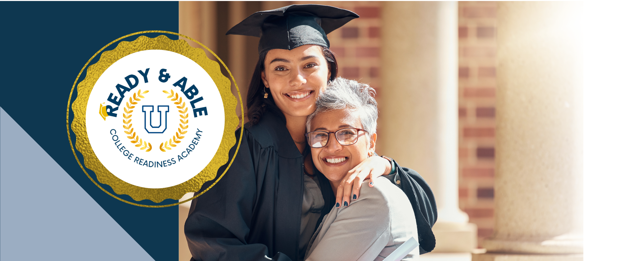 Woman and graduate posing in front of a brick wall. 