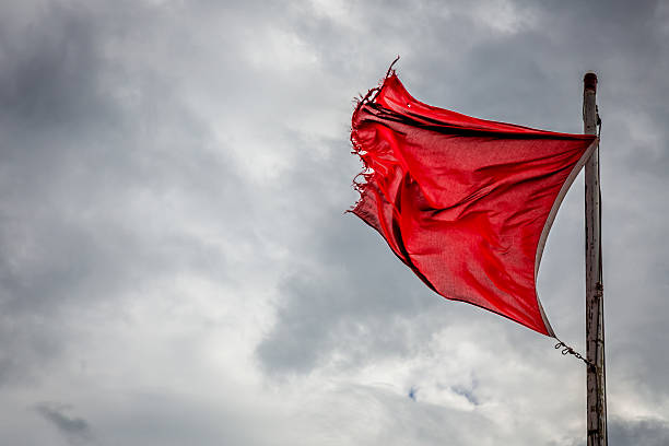Reg Flag waving on a cloudy day.